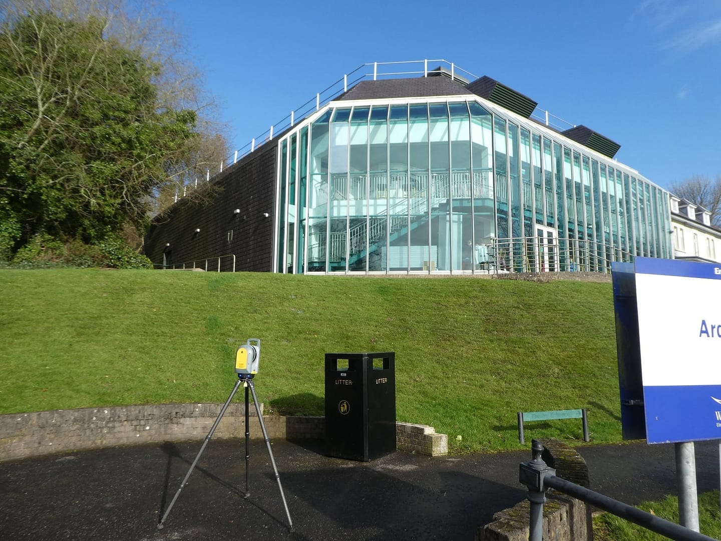 Photograph of 26,000sq/ft Listed Commercial building Ardhowen Theatre in Enniskillen, showing 3d laser scanner used to collect the 3D point-cloud data.
